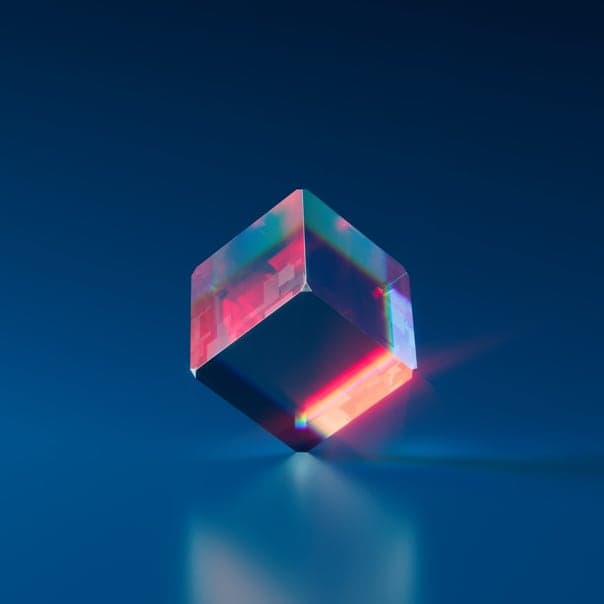 glass cube balancing on one corner
